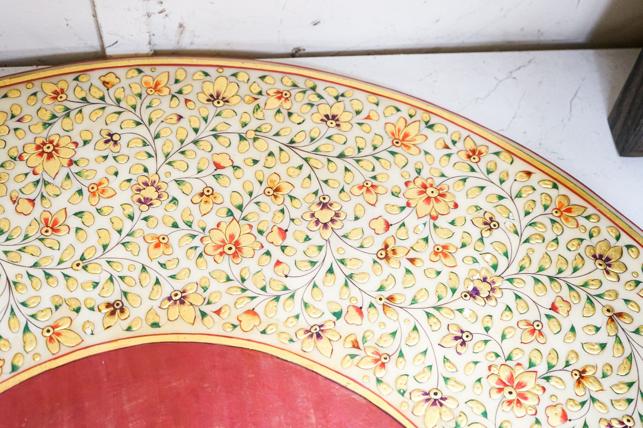 An Indian Kashmiri painted alabaster table top 76cm